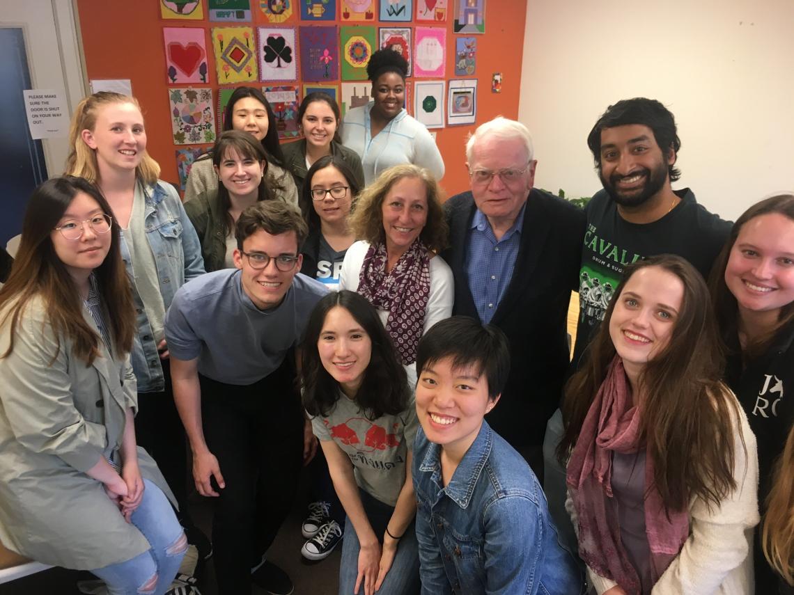 Neal Ball, Founder and Honorary President of the American Refugee Committee, and students