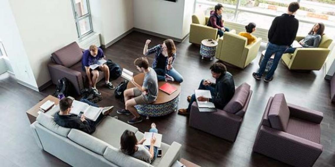 Students gather in a lounge at 560 Lincoln. Photo by Jim Prisching